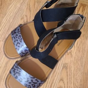 Glossy leopard and black strappy sandals